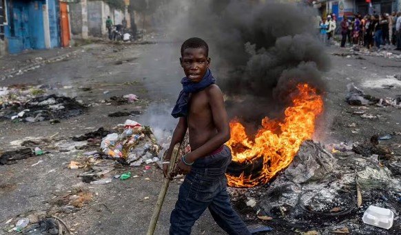 Haiti bolo podľa niektorých interpretácií opísané ako „väzenie pod holým nebom“.