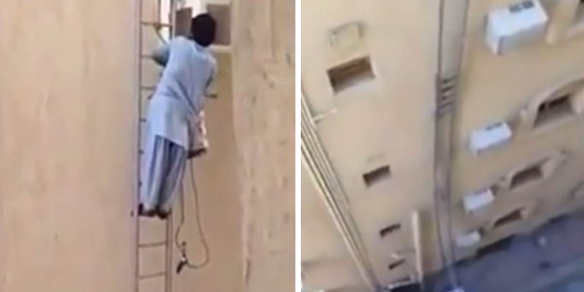 VIDEO Toto chce odvahu: Indický pracovník opravuje klimatizáciu vo výške 20 metrov na rebríku